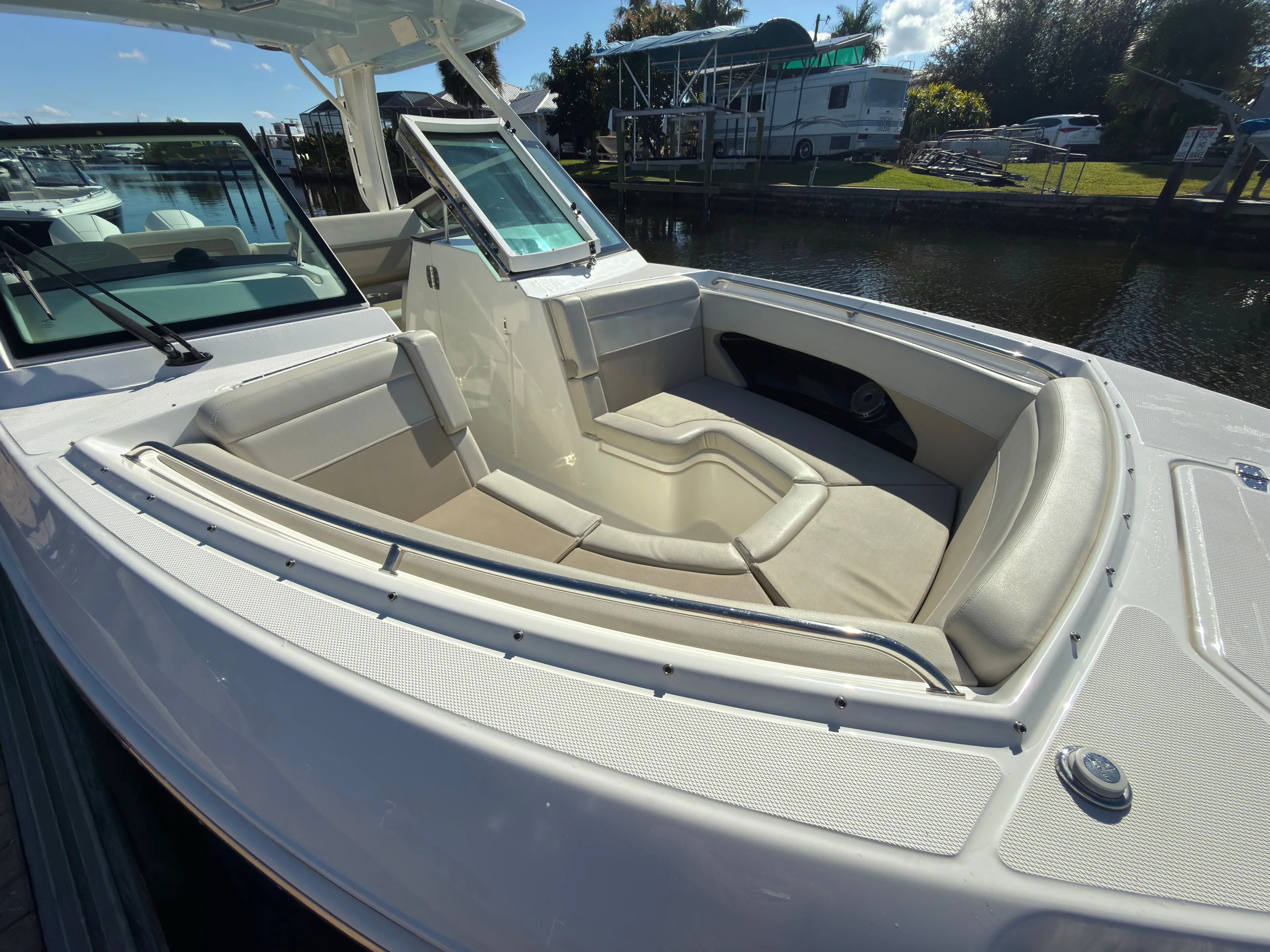 Yacht Photos Pics Boston Whaler 280 Vantage 2023 with luxurious outdoor seating area.