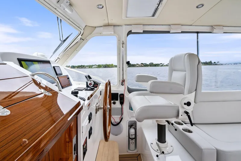 Tumalum Yacht Photos Pics Interior of 2023 MJM 35 yacht with modern helm and luxurious seating.