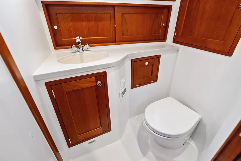Tumalum Yacht Photos Pics Elegant 2023 MJM 35 yacht bathroom with wooden cabinets and modern fixtures.