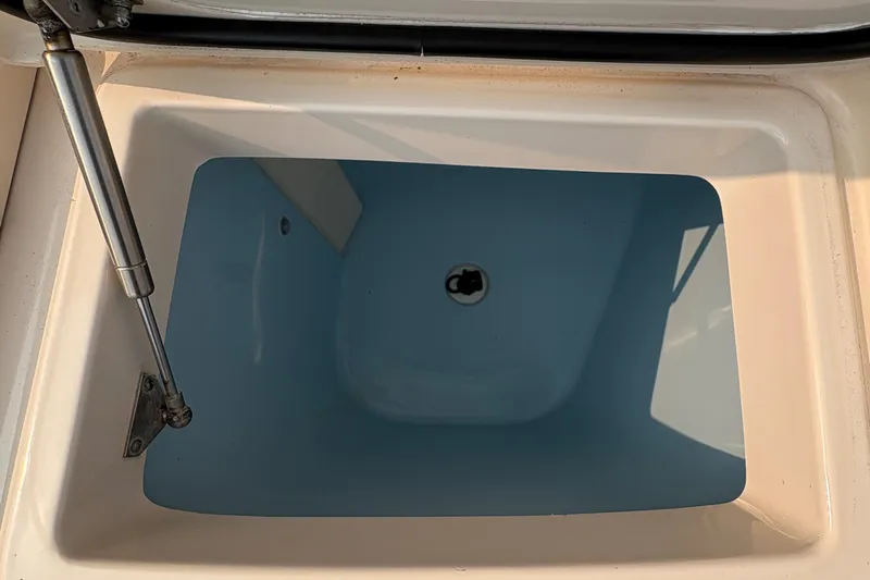  Yacht Photos Pics Livewell compartment on a 2013 Grady-White Canyon 306 boat, open and empty.