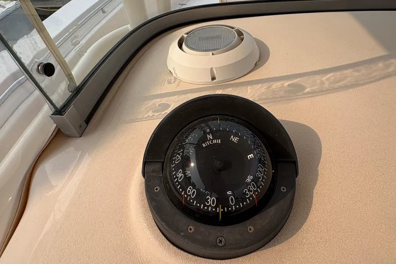  Yacht Photos Pics Compass on 2013 Grady-White Canyon 306 boat dashboard, showing navigation details.