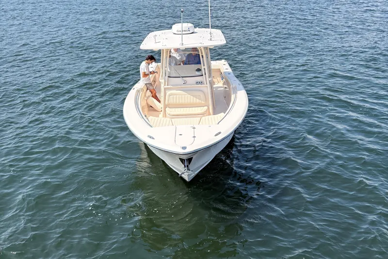  Yacht Photos Pics 2013 Grady-White Canyon 306 boat on water, viewed from above.