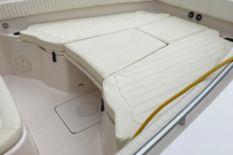  Yacht Photos Pics 2013 Grady-White Canyon 306 boat interior with cushioned seating area.