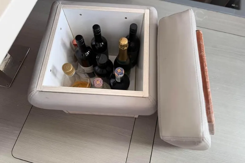 Sweet 2 Bad Yacht Photos Pics Hidden compartment with assorted bottles inside a Leopard 404, 2016 model.