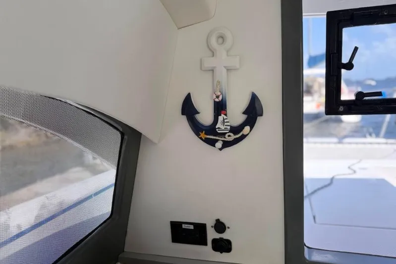 Sweet 2 Bad Yacht Photos Pics Interior of 2016 Leopard 404 yacht with nautical anchor decor.
