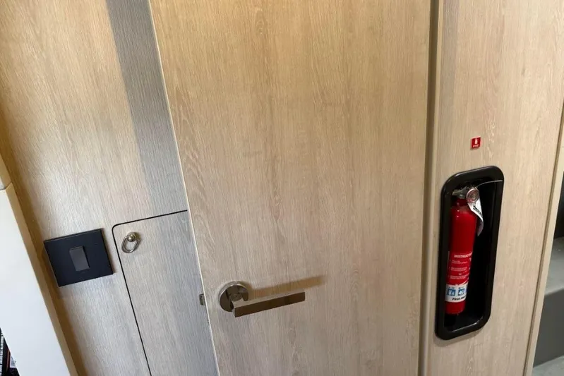 Sweet 2 Bad Yacht Photos Pics Wooden door with fire extinguisher, Leopard 404, 2016 model.