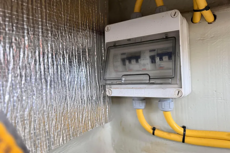 Sweet 2 Bad Yacht Photos Pics Electrical panel with yellow cables in a Leopard 404, 2016 model.