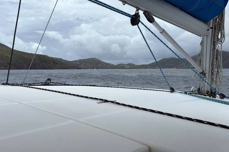 Sweet 2 Bad Yacht Photos Pics Sailing on a 2016 Leopard 404 catamaran with scenic ocean and island views.