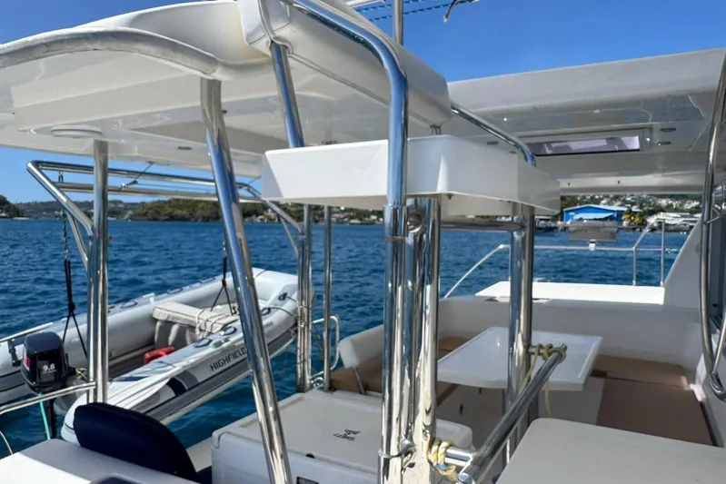 Sweet 2 Bad Yacht Photos Pics 2017 Leopard 40 catamaran with sleek design, docked on blue waters, featuring modern amenities.