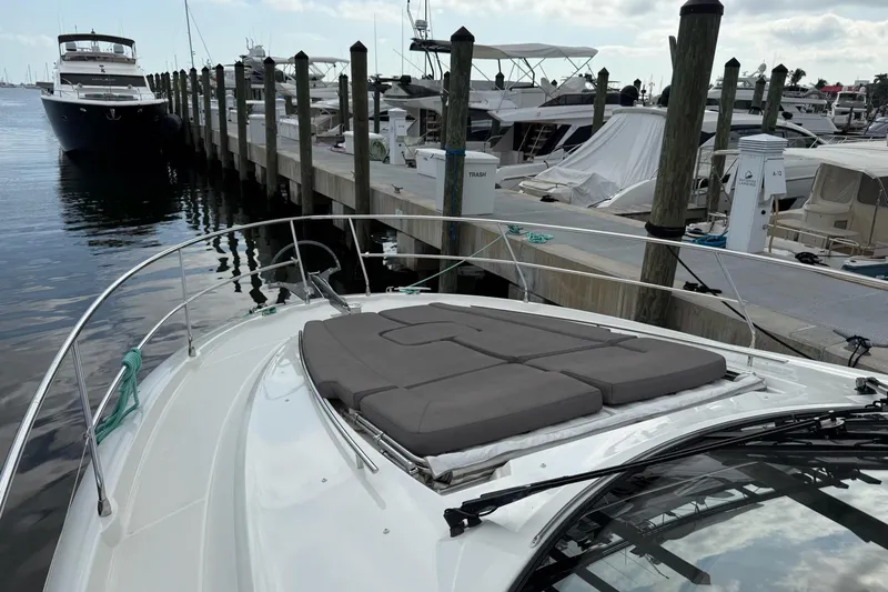 Top Nach Yacht Photos Pics Prestige 500S 2017 yacht docked at marina with sunpad and clear sky.