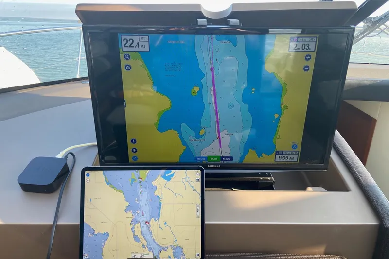 Top Nach Yacht Photos Pics Navigation screens on a 2017 Prestige 500S yacht displaying nautical charts.