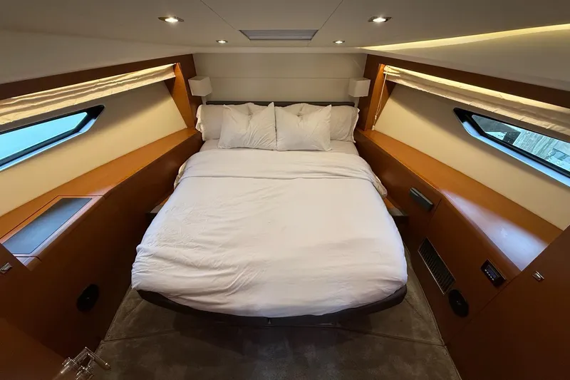 Top Nach Yacht Photos Pics Luxurious bedroom interior of 2017 Prestige 500S yacht with cozy bedding and modern design.