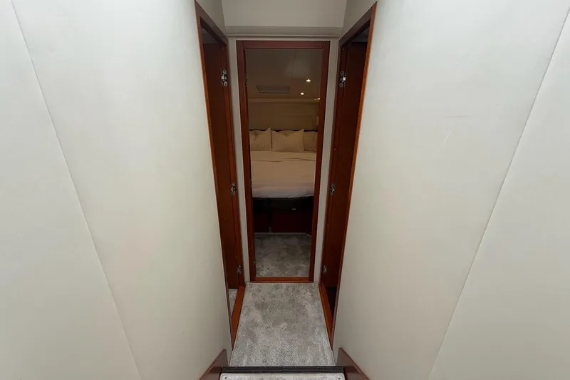 Top Nach Yacht Photos Pics Hallway leading to bedroom in 2017 Prestige 500S yacht, featuring modern interior design.