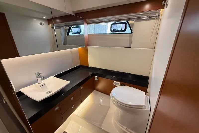 Top Nach Yacht Photos Pics Luxurious bathroom in 2017 Prestige 500S yacht with modern fixtures and elegant design.
