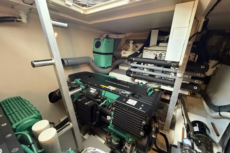 Top Nach Yacht Photos Pics Engine room of a 2017 Prestige 500S yacht, showcasing mechanical components.