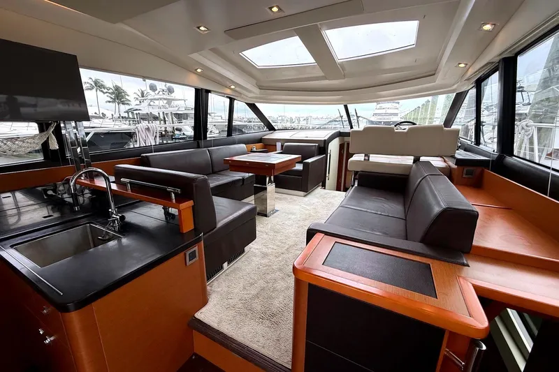 Top Nach Yacht Photos Pics Luxurious interior of a 2017 Prestige 500S yacht with modern seating and sleek design.