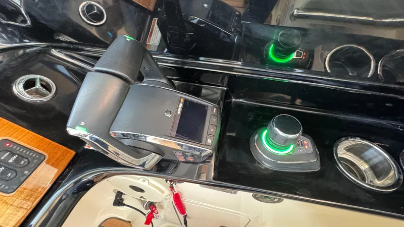 Sea Dragon Yacht Photos Pics Control panel of 2023 Chris-Craft Calypso 35 boat with joystick and throttle.