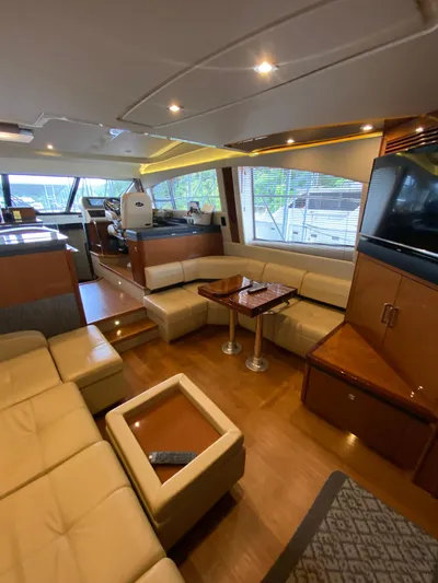Yonder Star Yacht Photos Pics Luxurious interior of 2016 Sea Ray 510 Fly yacht with plush seating and modern amenities.