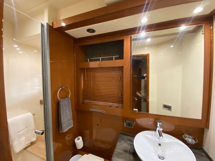 Yonder Star Yacht Photos Pics Luxurious bathroom interior of 2016 Sea Ray 510 Fly yacht with modern fixtures.
