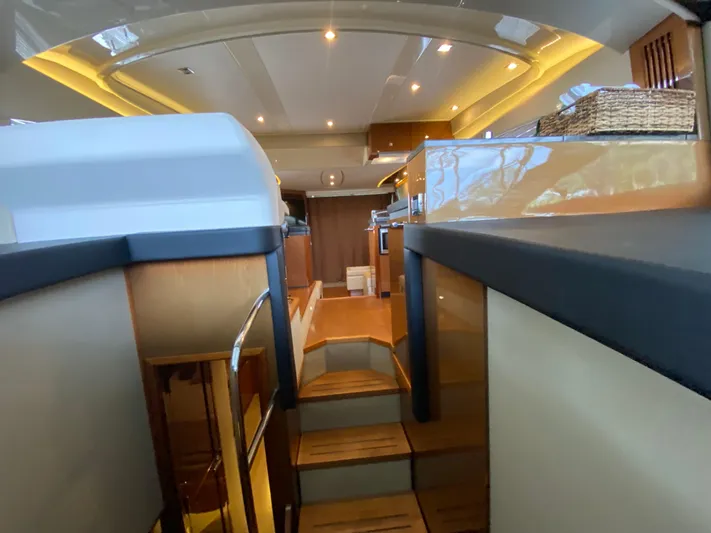 Yonder Star Yacht Photos Pics Interior view of 2016 Sea Ray 510 Fly yacht, featuring modern design and elegant lighting.