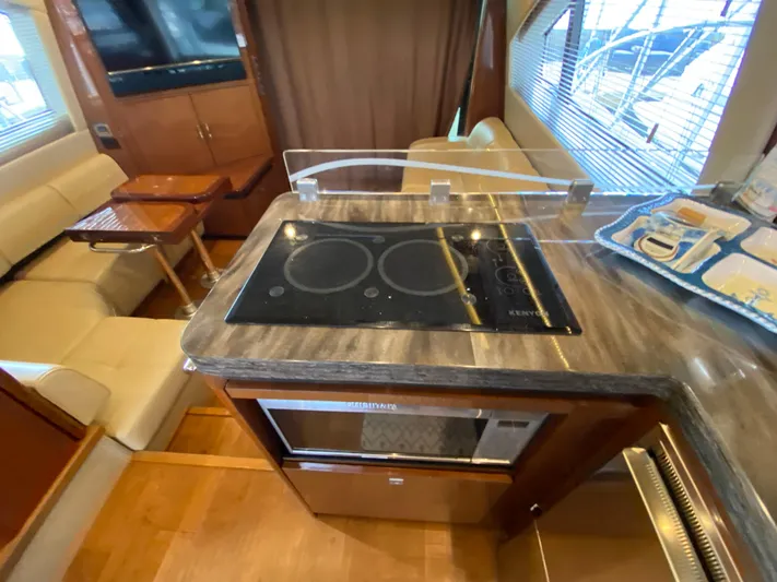 Yonder Star Yacht Photos Pics Luxurious interior of 2016 Sea Ray 510 Fly yacht with modern kitchen amenities.