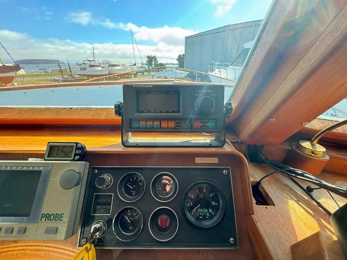  Yacht Photos Pics Cockpit view of 1980 Ocean Alexander 50 MK1 with navigation instruments and gauges.