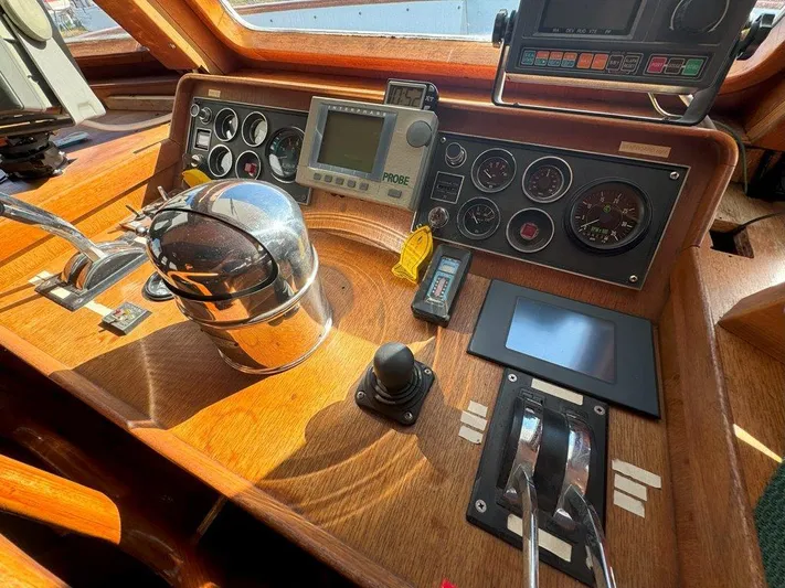  Yacht Photos Pics Cockpit of 1980 Ocean Alexander 50 MK1 yacht with navigation instruments and controls.
