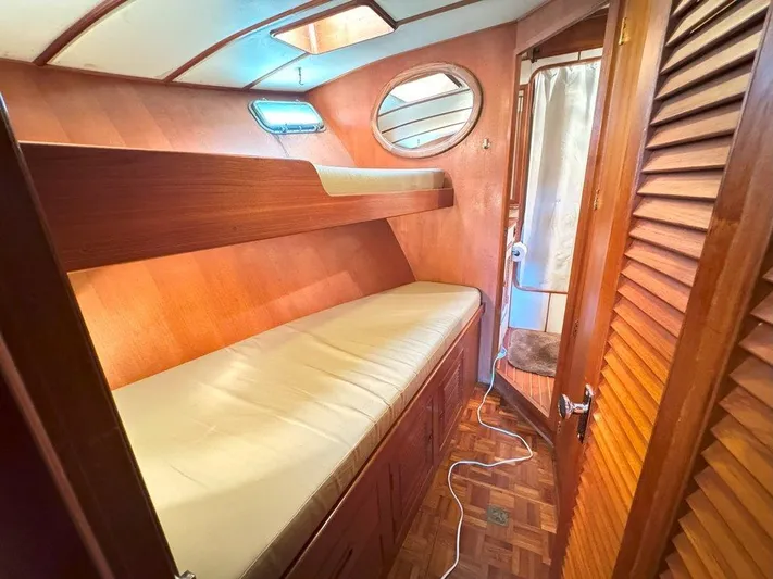  Yacht Photos Pics 1980 Ocean Alexander 50 MK1 cabin with wooden interior and bunk beds.