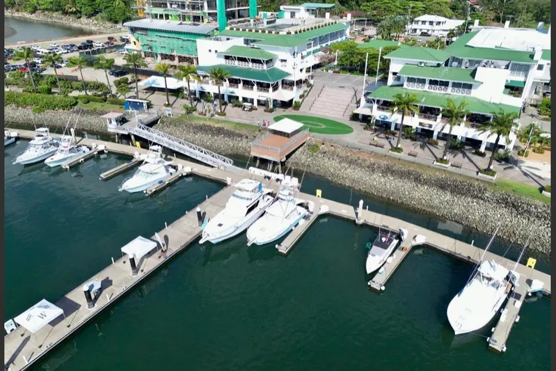 Yacht Photos Pics Aerial view of marina with Cabo 40 Express Los Suenos 2004 boats docked.