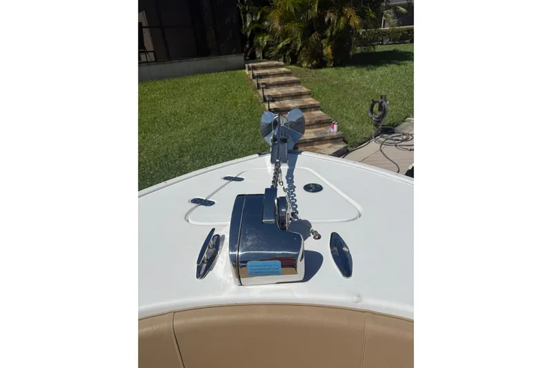  Yacht Photos Pics 2019 Cape Horn 27XS boat anchor system on deck, with lush greenery in the background.