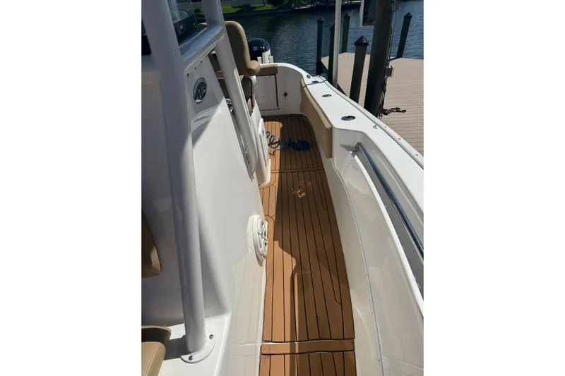  Yacht Photos Pics 2019 Cape Horn 27XS boat with teak deck, docked at marina.