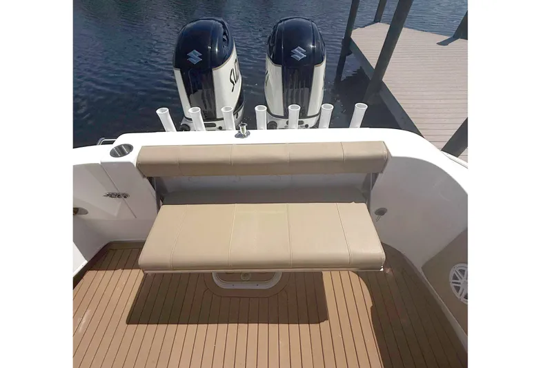  Yacht Photos Pics 2019 Cape Horn 27XS boat interior with seating and dual engines.
