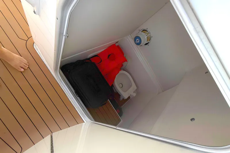  Yacht Photos Pics 2019 Cape Horn 27XS boat interior with head and life jackets.
