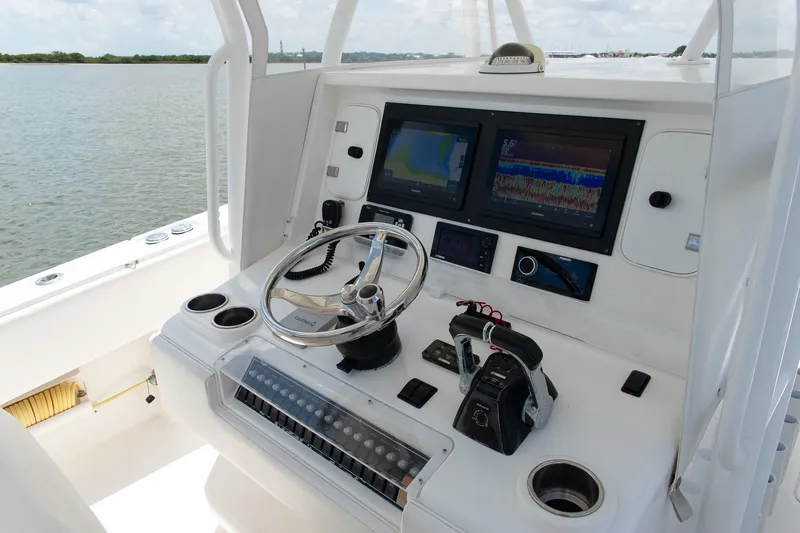  Yacht Photos Pics 2015 Invincible 36 Open Fisherman helm with advanced navigation displays and controls.