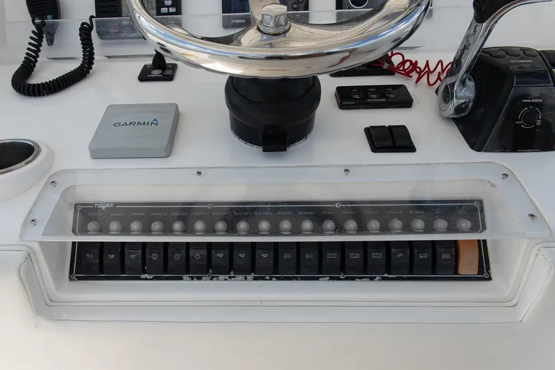  Yacht Photos Pics Control panel of a 2015 Invincible 36 Open Fisherman boat with Garmin navigation.