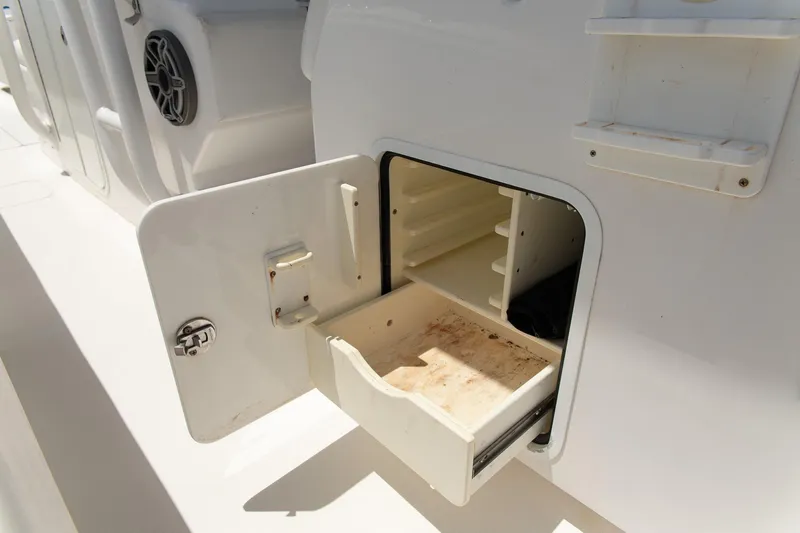 Yacht Photos Pics Open storage compartment on 2015 Invincible 36 Open Fisherman boat.