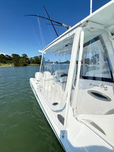  Yacht Photos Pics 2018 Sea Hunt Gamefish 30 boat with forward seating on calm water.