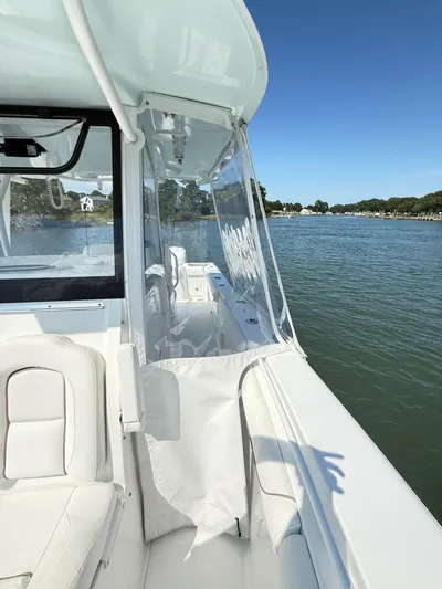  Yacht Photos Pics 2018 Sea Hunt Gamefish 30 boat with forward seating on a sunny day.