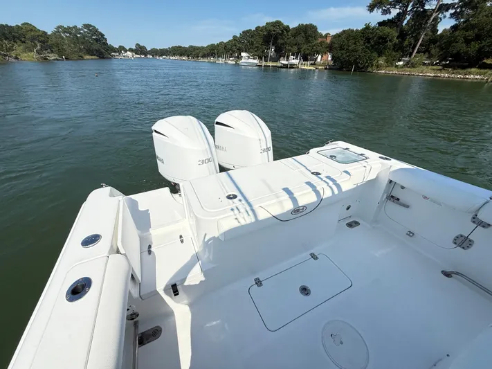  Yacht Photos Pics 2018 Sea Hunt Gamefish 30 boat with twin Yamaha 300 engines on a calm river.