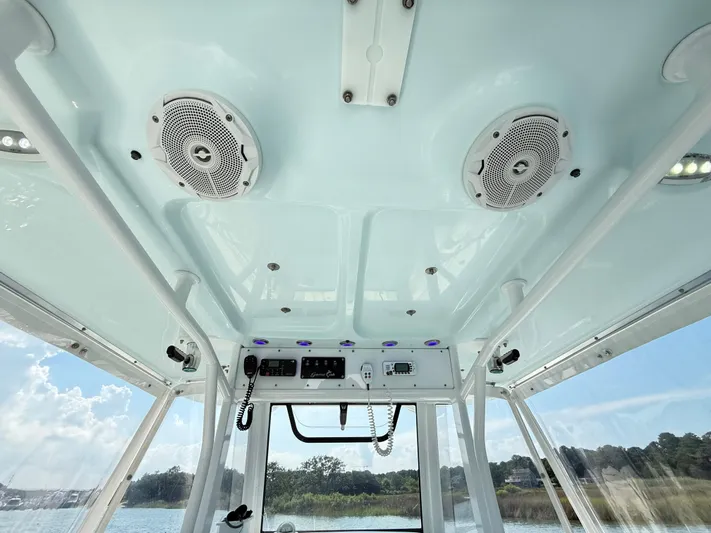  Yacht Photos Pics Interior view of 2018 Sea Hunt Gamefish 30 boat with speakers and control panel.