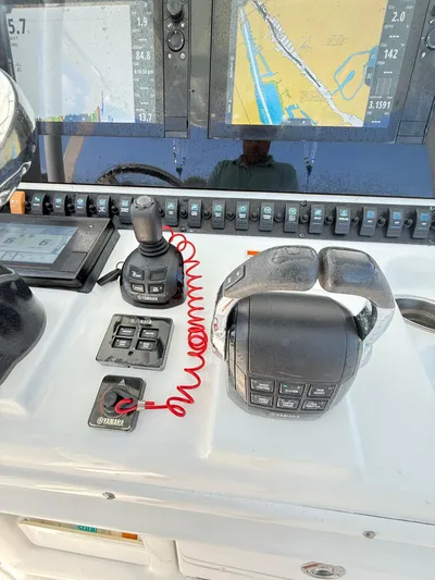  Yacht Photos Pics Control panel of 2018 Sea Hunt Gamefish 30 with navigation screens and Yamaha controls.