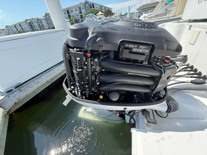  Yacht Photos Pics 2018 Sea Hunt Gamefish 30 engine, open cover, docked in marina.