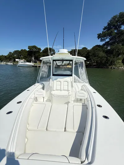  Yacht Photos Pics 2018 Sea Hunt Gamefish 30 boat with forward seating, docked on a sunny day.