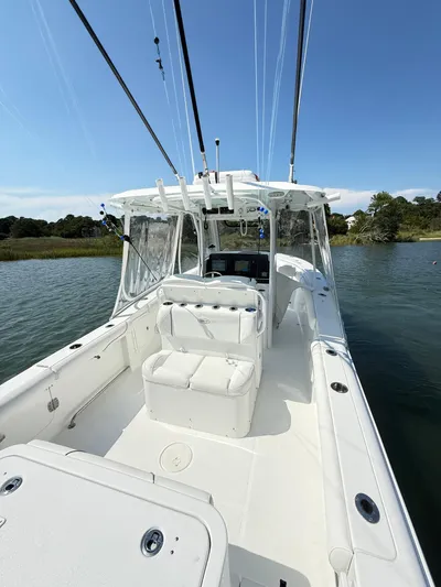  Yacht Photos Pics 2018 Sea Hunt Gamefish 30 boat with forward seating on calm water.