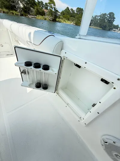  Yacht Photos Pics 2018 Sea Hunt Gamefish 30 boat storage compartment with rod holders, near scenic waterway.