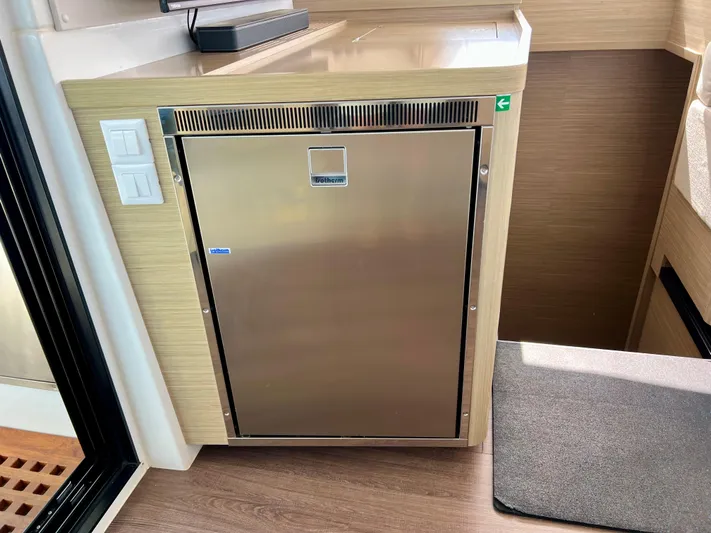 Roxie Yacht Photos Pics Stainless steel fridge in 2024 Lagoon 42 yacht interior.