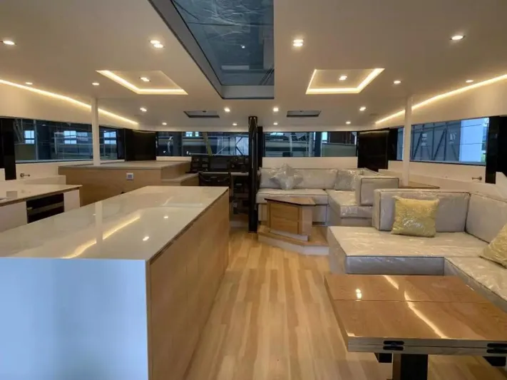  Yacht Photos Pics Luxurious interior of 2026 McConaghy MC55 yacht with modern design and spacious seating.