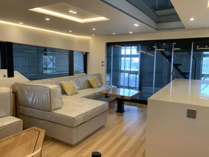  Yacht Photos Pics Luxurious interior of 2026 McConaghy MC55 yacht with modern seating and sleek design.