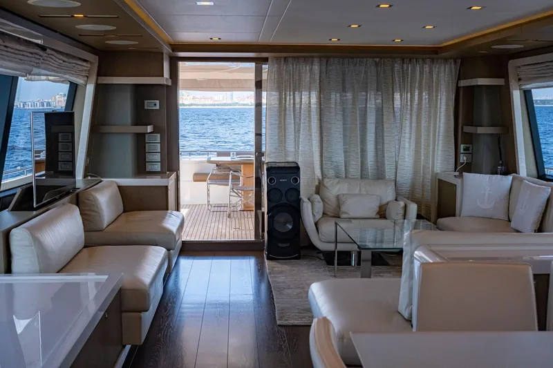  Yacht Photos Pics Luxurious interior of 2013 Ferretti Yachts 870 with elegant seating and ocean view.