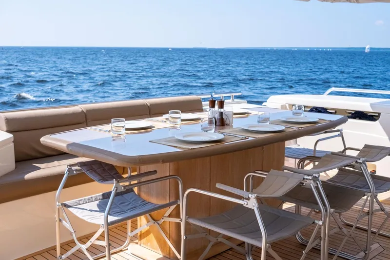  Yacht Photos Pics Luxury dining area on 2013 Ferretti Yachts 870 with ocean view.